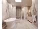 Elegant bathroom with freestanding tub, walk-in shower, and designer details at 284 Meeting St # 301, Charleston, SC 29401
