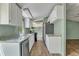 Modern kitchen with stainless steel appliances and white cabinets at 137 Thelma Dr, Summerville, SC 29485