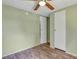 Simple bedroom with ceiling fan and wood-look flooring at 137 Thelma Dr, Summerville, SC 29485