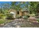 Single wide mobile home with side yard and mature trees at 137 Thelma Dr, Summerville, SC 29485