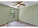 Simple bedroom with ceiling fan and wood-look flooring at 137 Thelma Dr, Summerville, SC 29485