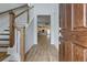 Open entryway with hardwood floors, stairs, and a view of the living area at 427 Grove End Rd, Moncks Corner, SC 29461