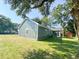 Gray house with a screened porch and a large backyard at 102 Whitesville Rd, Moncks Corner, SC 29461