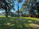 House with a large backyard and screened porch at 102 Whitesville Rd, Moncks Corner, SC 29461