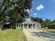 Newly built gray house on a grassy lot at 102 Whitesville Rd, Moncks Corner, SC 29461