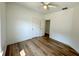 Bright bedroom with wood-look flooring and an adjacent room at 102 Whitesville Rd, Moncks Corner, SC 29461