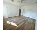 Spacious bedroom with wood-look flooring and ample closet space at 102 Whitesville Rd, Moncks Corner, SC 29461