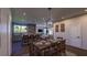 Open concept dining room with farmhouse table and kitchen views at 412 Oak Hammock Ct # 53, Johns Island, SC 29455