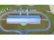 Top-down view of a large metal roof barn with a paved circular driveway at 210 Oyster Catcher Ln, Ravenel, SC 29470