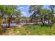 Peaceful waterfront view with lush greenery and a calm waterway at 210 Oyster Catcher Ln, Ravenel, SC 29470