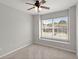 Spacious bedroom with ceiling fan and window at 107 Darcy Avenue, Goose Creek, SC 29445