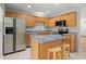 Kitchen with light wood cabinets, stainless steel appliances, and granite countertops at 107 Darcy Avenue, Goose Creek, SC 29445