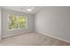 Bright bedroom with carpeted floors and a large window at 107 Darcy Avenue, Goose Creek, SC 29445