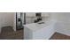 Modern kitchen with white cabinets and stainless steel appliances at 426 Grove End Rd, Moncks Corner, SC 29461