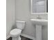 Clean bathroom with pedestal sink and updated fixtures at 426 Grove End Rd, Moncks Corner, SC 29461