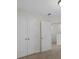 Simple bedroom with double door closet and carpet flooring at 426 Grove End Rd, Moncks Corner, SC 29461