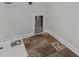 Small laundry room with vinyl flooring and built-in shelving at 426 Grove End Rd, Moncks Corner, SC 29461