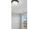 Bright bathroom with a glass shower and modern light fixture at 426 Grove End Rd, Moncks Corner, SC 29461