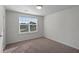 Spacious bedroom with large window and neutral decor at 426 Grove End Rd, Moncks Corner, SC 29461