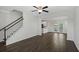 Open living room with hardwood floors and access to the kitchen at 426 Grove End Rd, Moncks Corner, SC 29461