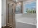 Bathroom with soaking tub and walk-in shower at 426 Grove End Rd, Moncks Corner, SC 29461