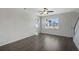 Bright living room featuring hardwood floors and a large window at 426 Grove End Rd, Moncks Corner, SC 29461