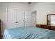 Spacious bedroom with double doors and a large dresser at 386 Tupelo Lake Dr, Summerville, SC 29486