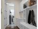 Convenient laundry room with built-in cabinets and a utility sink at 386 Tupelo Lake Dr, Summerville, SC 29486