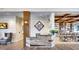 Elegant clubhouse lobby with a rustic-chic reception desk at 386 Tupelo Lake Dr, Summerville, SC 29486