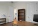 Spacious home office with wood floors, a built-in bookcase and an adjacent bathroom at 386 Tupelo Lake Dr, Summerville, SC 29486