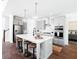 Modern kitchen with gray cabinets, white quartz countertops and stainless steel appliances at 366 Wappoo Trace Ln, Summerville, SC 29486