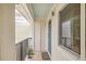 Bright and airy entryway with a teal door and small balcony at 266 Alexandra Dr # 15, Mount Pleasant, SC 29464