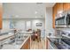 Eat-in kitchen with stainless steel appliances and view of dining area at 266 Alexandra Dr # 15, Mount Pleasant, SC 29464