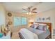 Bright bedroom with a ceiling fan and a comfortable bed at 266 Alexandra Dr # 15, Mount Pleasant, SC 29464