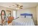 Spacious bedroom with a blue headboard and striped bedding at 266 Alexandra Dr # 15, Mount Pleasant, SC 29464