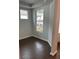 Living area with dark hardwood floors and large window at 741 Blue Iris Way, Summerville,  29486