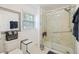 Bathroom featuring a walk-in shower and updated finishes at 5 Avon Ct, Charleston, SC 29407