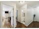Hallway with wood floors and access to bedrooms and bathroom at 5 Avon Ct, Charleston, SC 29407