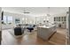 Open concept living space with kitchen, hardwood floors, and lake views at 301 Longshore St # 441, Charleston, SC 29492