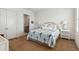 Guest bedroom with hardwood floors, and calming decor at 301 Longshore St # 441, Charleston, SC 29492