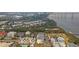 Aerial view showcasing a charming community by the river, featuring various housing styles at 301 Longshore St # 441, Charleston, SC 29492
