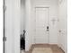 Light and airy entry with wood floors and a view of the front door at 301 Longshore St # 441, Charleston, SC 29492