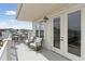 Relaxing balcony with rocking chairs and outdoor seating at 301 Longshore St # 441, Charleston, SC 29492