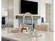 Modern kitchen sink and faucet on a large quartz countertop island at 301 Longshore St # 441, Charleston, SC 29492