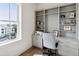 Bright home office with built-in shelving and large window at 301 Longshore St # 441, Charleston, SC 29492