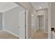 Upstairs hallway with neutral walls and carpet at 361 Wappoo Trace Ln, Summerville, SC 29486