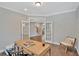 Cozy home office with built-in desk and French doors at 361 Wappoo Trace Ln, Summerville, SC 29486