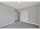 Spacious bedroom with double doors leading to a closet and additional door at 361 Wappoo Trace Ln, Summerville, SC 29486