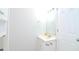 Small bathroom with vanity, mirror, and white cabinets at 1910 Tropicana Rd # 9-B, North Charleston, SC 29406