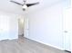 Spacious bedroom with ceiling fan and two entry doors at 1910 Tropicana Rd # 9-B, North Charleston, SC 29406